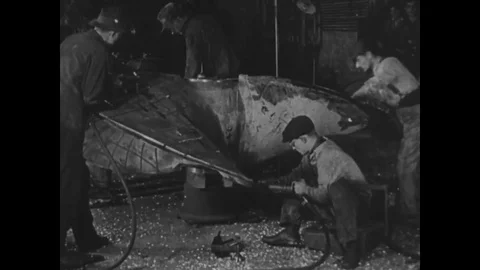 1910s - Workers begin to assemble ships in a ship building yard during WWI. Stock Footage 83103172