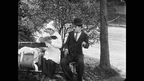 1915 - In this silent comedy, people plot ways to disrupt a man's (Charlie Stock Footage 234502716