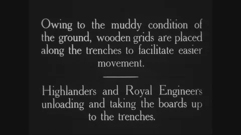 1916 - Highlanders and Royal Engineers lay down wooden grids on muddy roads in Stock Footage 124166594