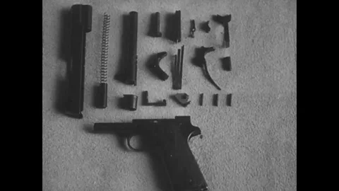 1918 - Stop-motion animation is used to show a Colt pistol assembling itself. Vídeos de archivo 124100760