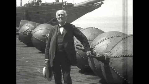 1918 - Thomas Edison standing beside water mines Stock Footage 108779712