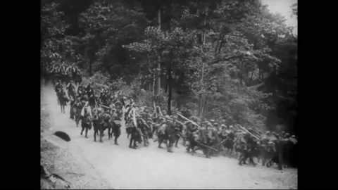 1918 - Troops march to an embarkation point at a port in Hoboken, New Jersey, Stock Footage 238674908