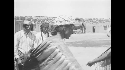 1919 - Native Americans in Santa Fe, New Mexico wear feathered costumes and a Stock Footage 152507902
