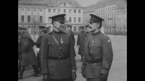 1919 - Newly decorated men of the 3rd Army pose with each other, before troops Stock Footage 103318933