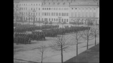 1919 - Troops march in the town square and General John J. Pershing at the port Stock Footage 86575026