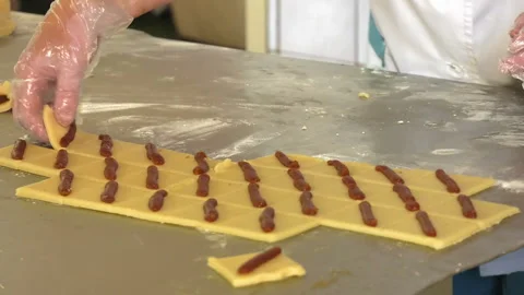 192. The finished thin short dough is cut in squares. Stock Footage 93644478