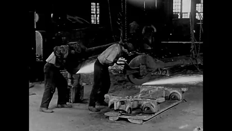 1920 - Aloxite redmanol high speed wheels remove metal and grind the teeth of a Stock Footage
