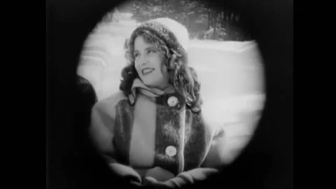 1920 - In this American silent comedy starring Olive Thomas, a couple rides in a Stock Footage 238772790