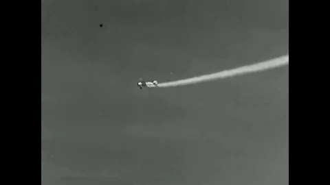 1920 - A biplane flies and scale models of early aircraft are shown in flight. Stock Footage 83104862