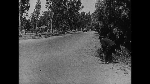 1920-Harold Lloyd / Slapstick / Get Out and Get Under / USA / 1920 Stock Footage