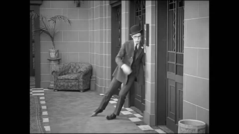 1920 - In this silent comedy, a drunk man (Harold Lloyd) flirts with a woman in Stock Footage 168968780