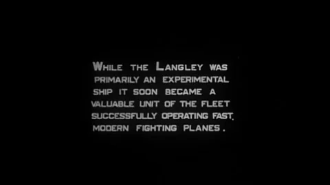 1920 - Slow motion is used to show an aircraft landing on the USS Langley but Stock Footage 126051410