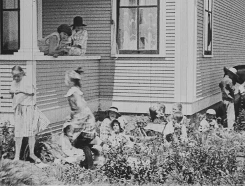 1920s - Children playing, fighting during recess at rural school Stock Footage 166538342