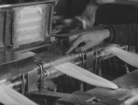 1920s - Cotton mill - Inside of combing, drawing machine Stock Footage 170503552