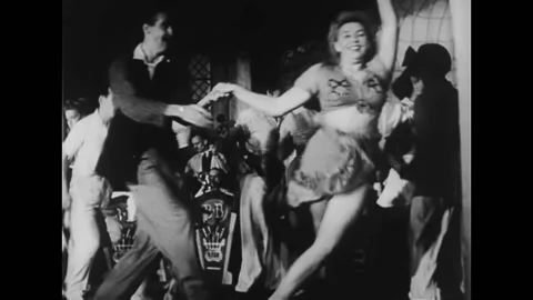 1920s - Couples dance the Charleston for fun and other dances at a party. Stock Footage
