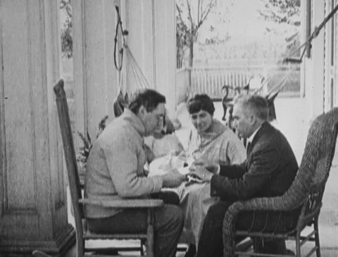 1920s - People talking about tuberculosis on farmhouse porch Stock Footage 166546775