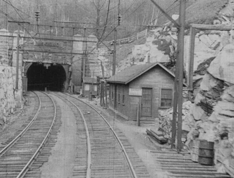 1920s - POV train entering, exiting tunnel Stock Footage 170528837