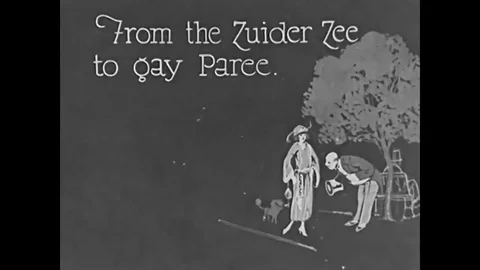 1923 - A cafe, the Eiffel Tower, the bridges on the Seine, and the Champs Stock Footage 83419951