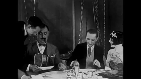 1924 - An undercover cop is drugged and kidnapped at a speakeasy. Stock Footage