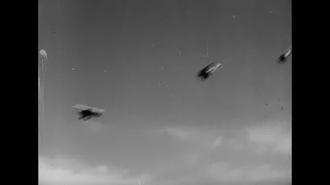 1925 - Dive bombers attack enemy, fly in formation, and return to their aircraft Stock Footage 246280527
