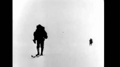 1925 - Polar explorers Roald Amundsen and Lincoln Ellsworth set out on skis, Stock Footage 241807207