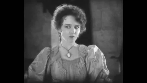 1925 - In this silent adaptation of the Phantom of the Opera, Christine unmasks Stock Footage 155800757