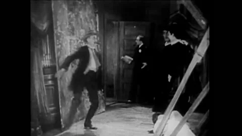 1926 - In this silent comedy, a cop crashes a production of Romeo and Juliet Stock Footage 203757697