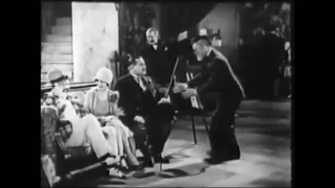 1926 - In this silent comedy, a man interrupts a chess game at a country club Stock Footage 173132553
