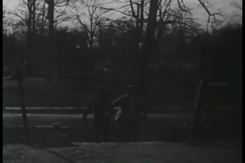 1926 - Two men arrive at a country club in time to break up a fight among golf Stock Footage 99668662