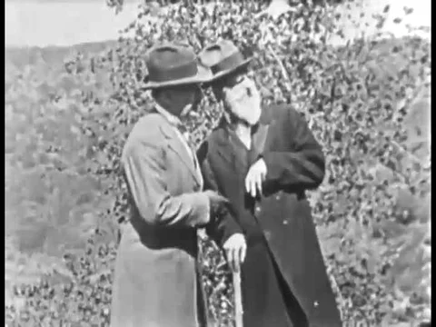 1926, Two men plot to steal a formula for youthfulness, and a man shows an ild Vídeos de archivo 83215509