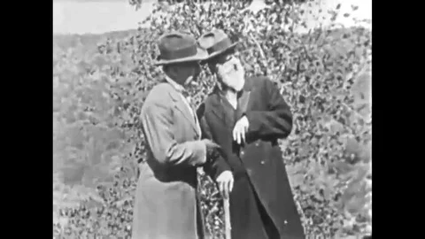 1926 Two men plot to steal a formula for youthfulness, and a man shows an ild Vídeos de archivo 115669350