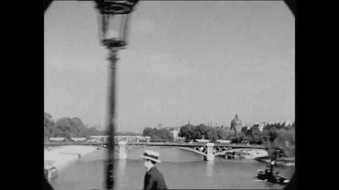 1927 - A camera mounted on a car drives across the Pont Royal to Notre Dame in Stock Footage 145395514
