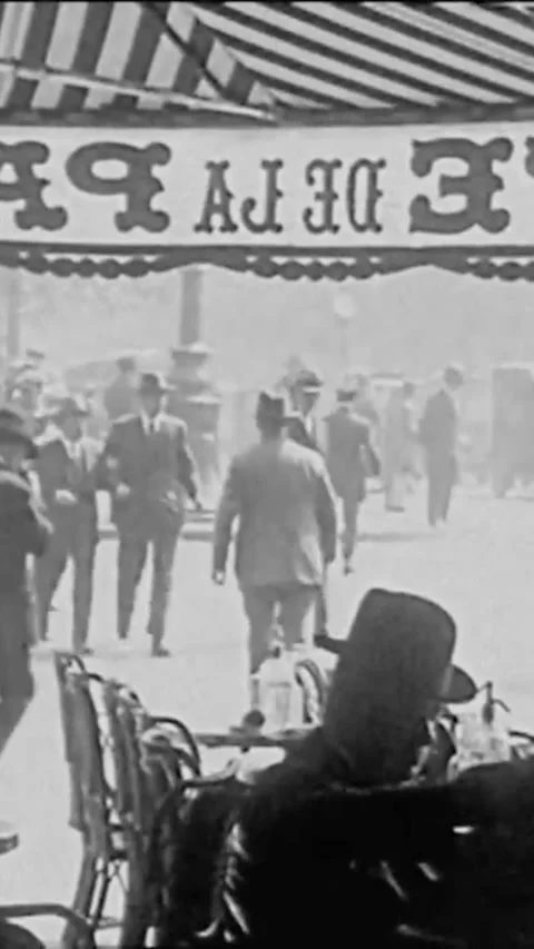 1927 - Guests leave the Cafe de la Paix in Paris, France, and patronize nearby Stock Footage 287583459