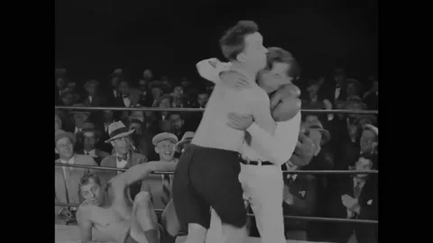 1927 - In this silent comedy, a boxer (Stan Laurel) fights the ref while his Stock Footage 238548436