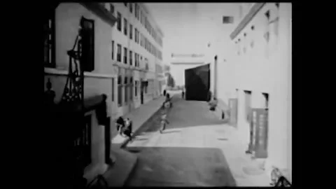 1927 - A visitor on a Paramount studio tour meets Will Rogers, Charles Bickford, Stock Footage 246364671