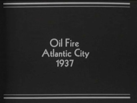 1928- Animated firemen bugs arrive at a building that is on fire, and try to get Vídeos de archivo 75763159