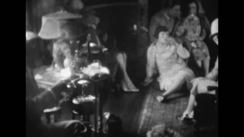 1928 - Lon Chaney hosts a casual party for his friends at home. Stock Footage 241809485