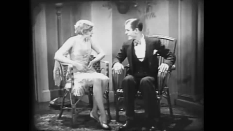 1928 - In this silent comedy, a flapper is baffled by bored people at a stuffy Stock-Footage 173134759