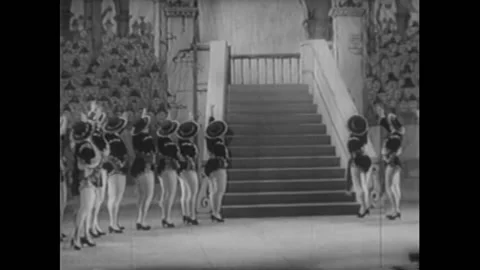 1929 - In this American Pre-Code musical, a man falls down stairs during his Stock Footage 220285971
