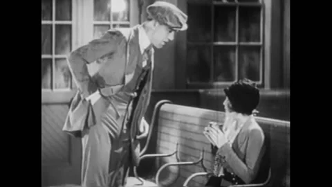 1929 - In this American Pre-Code musical, a man cheers up a woman and teachers Stock Footage 220285988