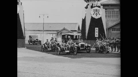 1930 - Emperor Hirohito reviews troops, including reservists, as they march Stock Footage 238601751