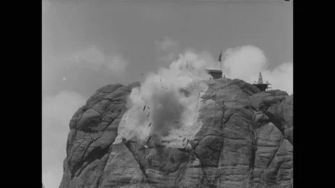 1930 - Men work on George Washington's face for Mount Rushmore. Stock Footage 238601685