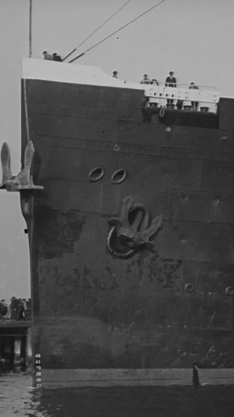 1930 - The SS Leviathan docks in Boston, Massachusetts, where men begin giving Video stock 284126792