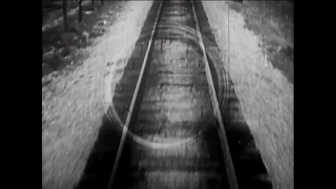 1930 - Train-mounted cameras capture the view of train tracks and of another Stock Footage 85957070