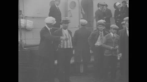 1930 - US Coast Guardsmen apprehend booze peddlers at a port in New York and Stock Footage 152532039