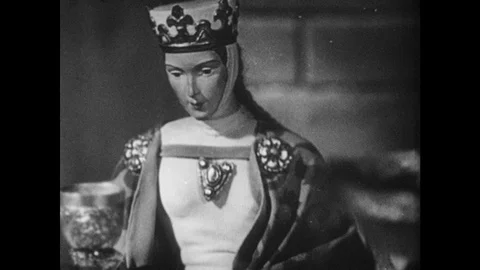 1930s: Animated, queen picks up cup / Man takes tray from chef, people enter and Vidéo 74940863