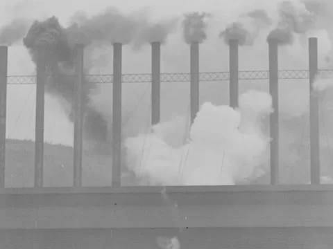 1930s: Billowing smokestacks Stock Footage 158247763