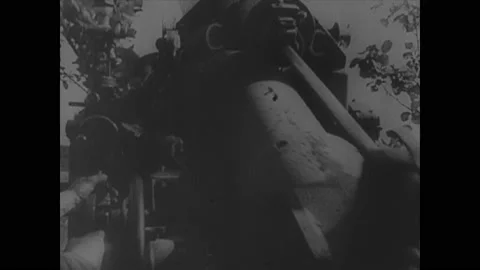 1930s: Bombs explode. Soldiers fire cannons. Arrows move across map of Soviet Vídeos de archivo 148227565