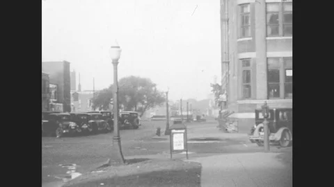 1930s: Cars Parked On City Street.