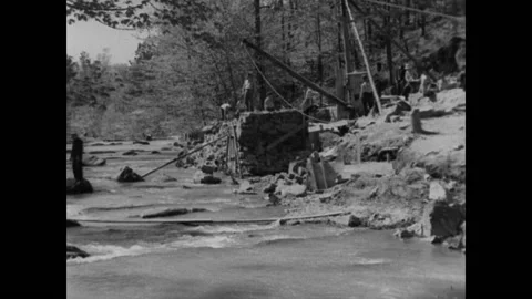 1930s - Constructing a river dam in Chewacla Sate Park, Alabama Stock Footage 157612306